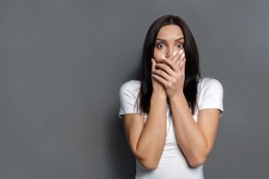 terrified-woman-thinks-of-destroyed-air-conditioner